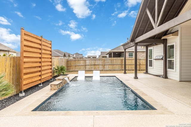 view of swimming pool featuring a patio area, a fenced backyard, and a fenced in pool