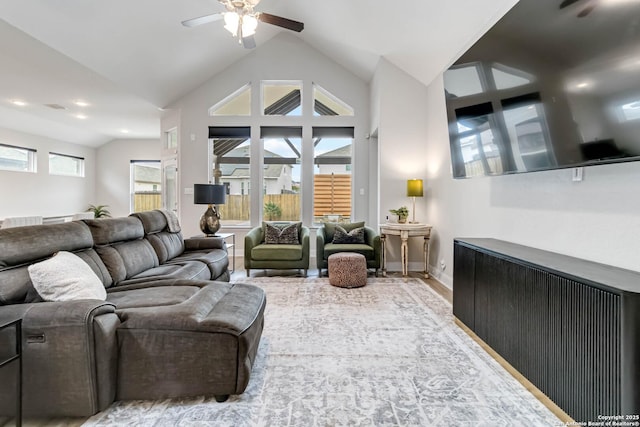 living room with vaulted ceiling and ceiling fan