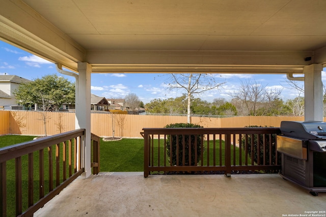 view of patio with a fenced backyard and area for grilling