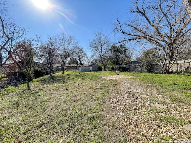 view of yard featuring fence