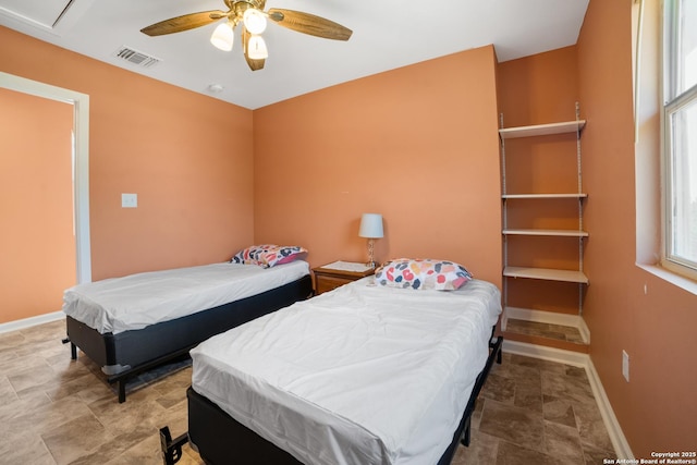 232 Hobart, San Antonio, TX 78237 - bedroom with baseboards and a ceiling fan