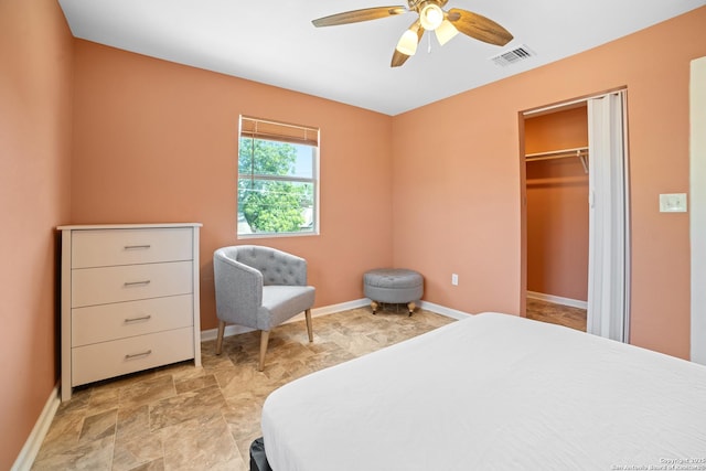232 Hobart, San Antonio, TX 78237 - bedroom with baseboards, stone finish floors, ceiling fan, and a closet