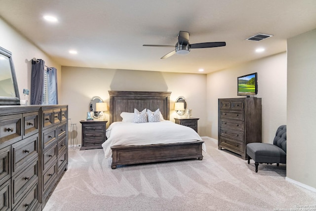 bedroom with recessed lighting, visible vents, a ceiling fan, light carpet, and baseboards