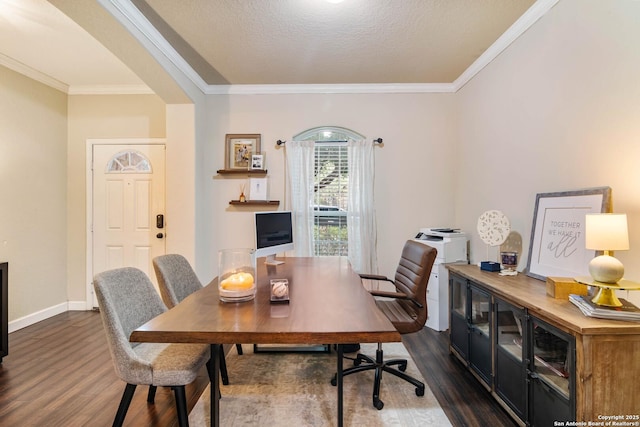 office with dark wood-style flooring, crown molding, and baseboards