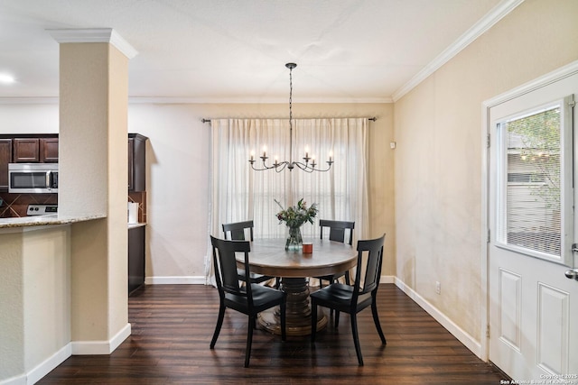 dining space featuring crown molding, dark wood finished floors, baseboards, and an inviting chandelier