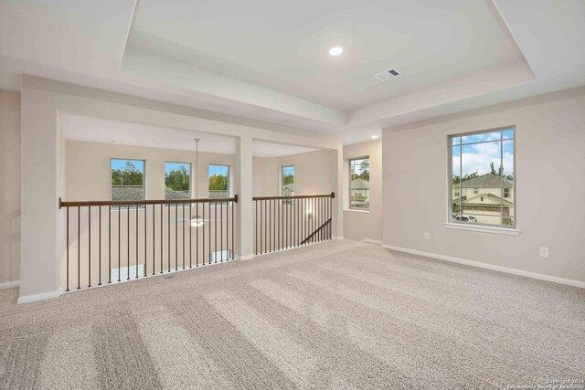 15046 Homing Mdw, San Antonio, TX 78253 - carpeted spare room featuring a raised ceiling, visible vents, and baseboards