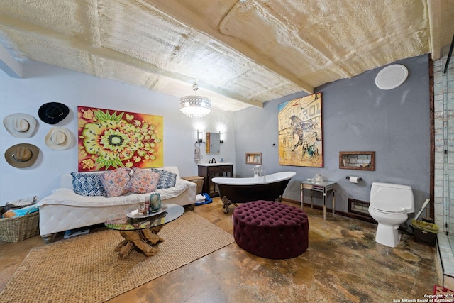 living area featuring concrete flooring