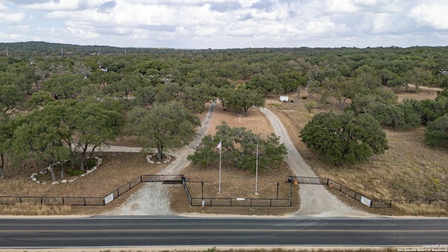 drone / aerial view with a forest view and a rural view