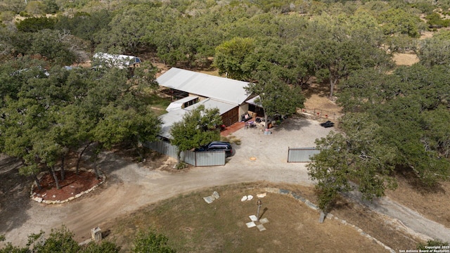 aerial view featuring a view of trees