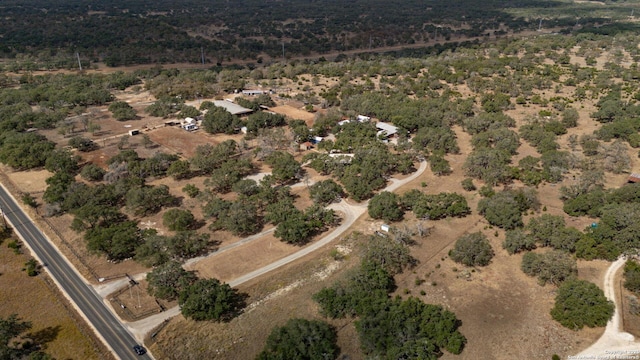 birds eye view of property featuring a rural view