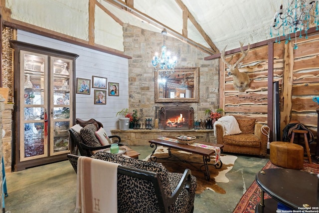 living area featuring vaulted ceiling, a fireplace, and unfinished concrete flooring