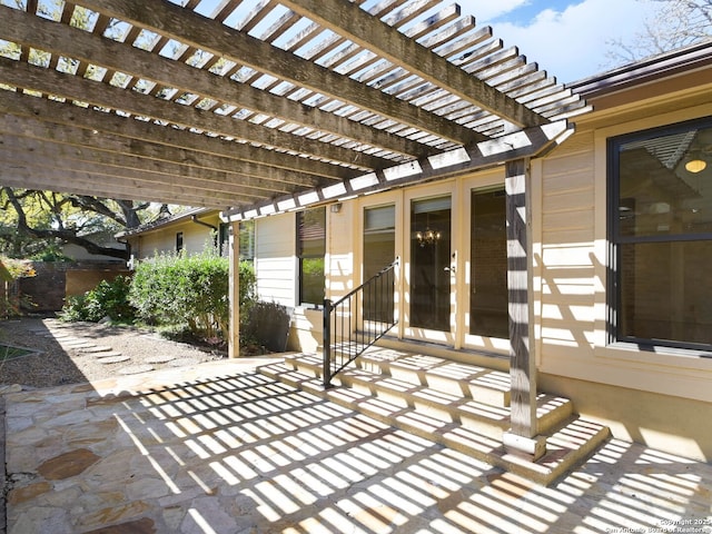 view of patio / terrace featuring a pergola and french doors