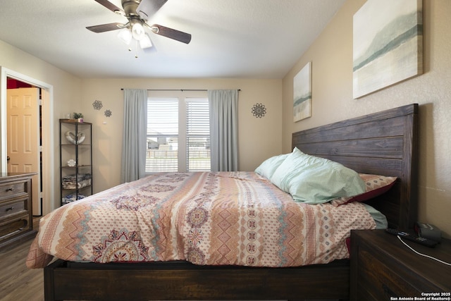 bedroom featuring ceiling fan and wood finished floors