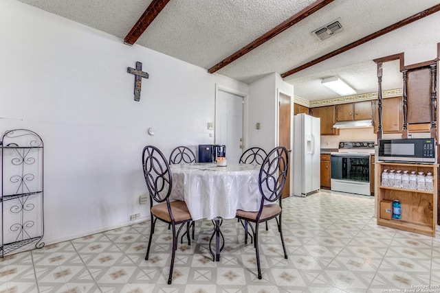 dining area featuring a textured ceiling, visible vents, baseboards, light floors, and beamed ceiling