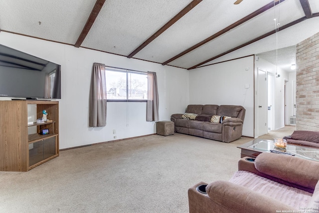 living area with a textured ceiling, carpet flooring, visible vents, and vaulted ceiling with beams