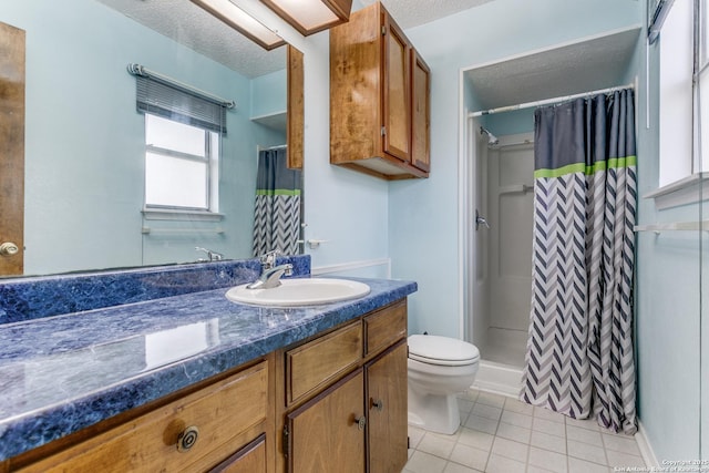 full bath featuring toilet, a shower stall, a textured ceiling, and tile patterned floors