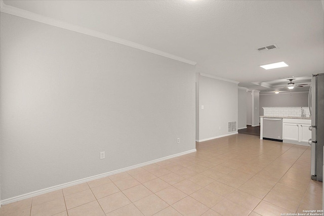 unfurnished living room with baseboards, ornamental molding, visible vents, and a ceiling fan