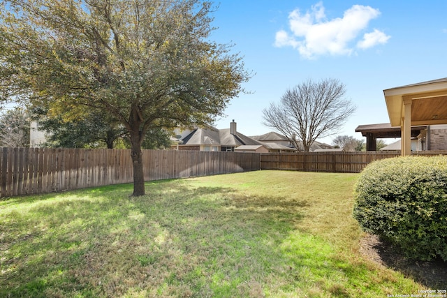 view of yard featuring a fenced backyard