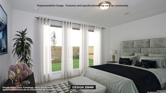 bedroom featuring multiple windows and visible vents