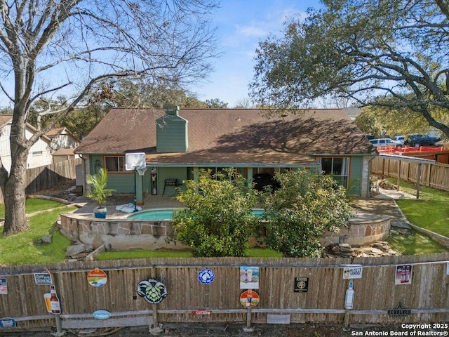 view of front of property featuring fence private yard