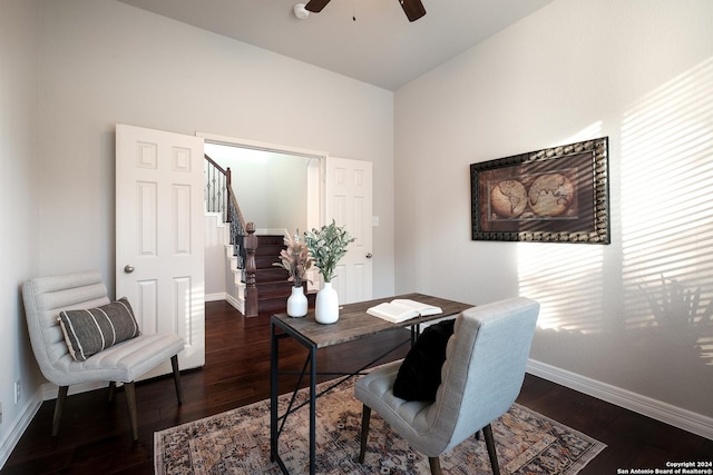 office area with dark wood-style floors, ceiling fan, and baseboards