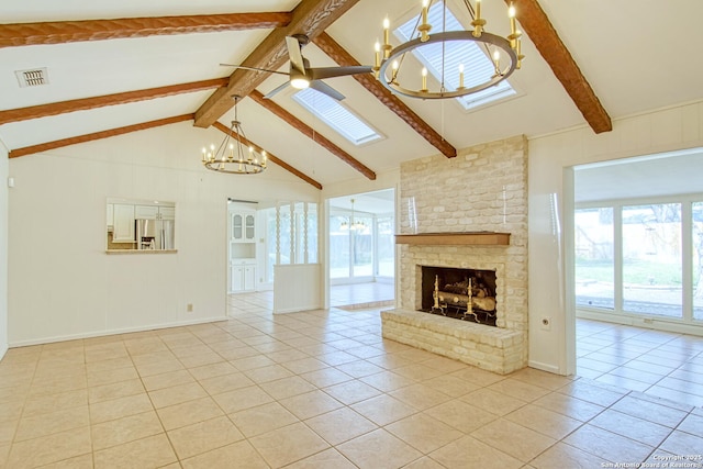 unfurnished living room featuring light tile patterned flooring, plenty of natural light, and visible vents