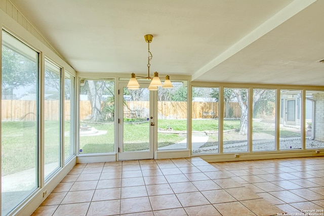 unfurnished sunroom with plenty of natural light