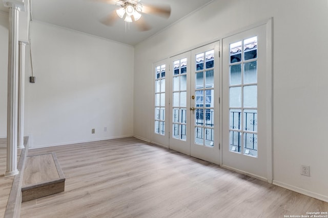 unfurnished room with a ceiling fan, french doors, light wood-style flooring, and baseboards