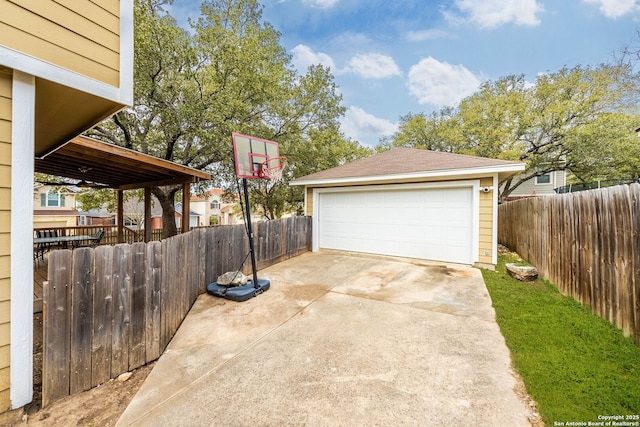 detached garage with fence