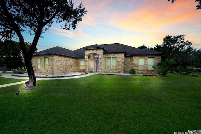 view of front of home with a front lawn