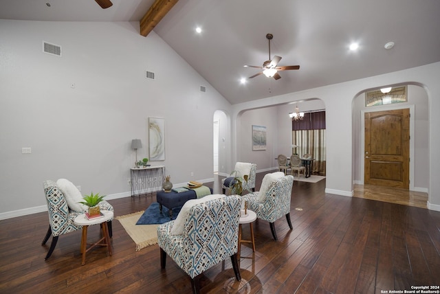 living room featuring arched walkways, ceiling fan with notable chandelier, wood-type flooring, and visible vents