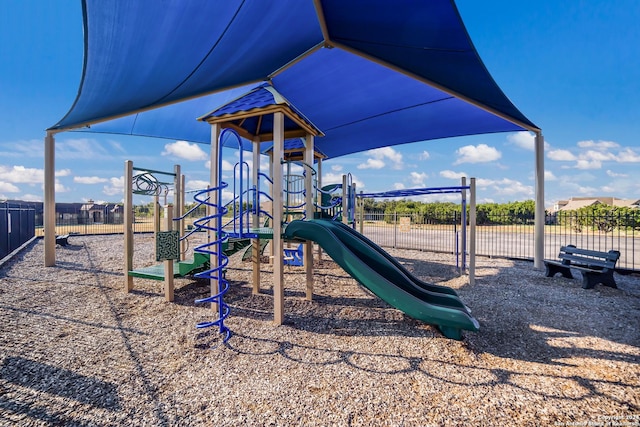 community playground featuring fence