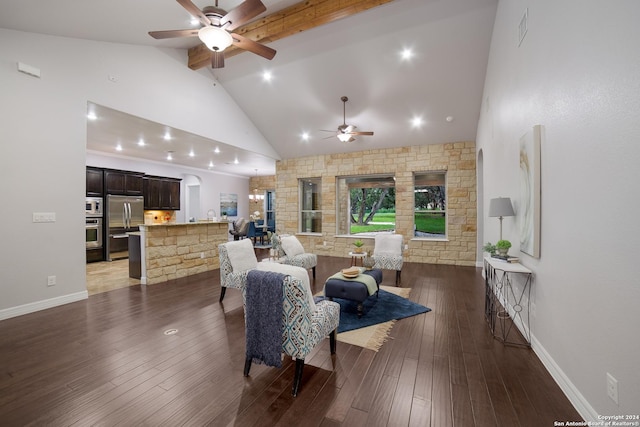 living area featuring high vaulted ceiling, hardwood / wood-style floors, beam ceiling, and baseboards