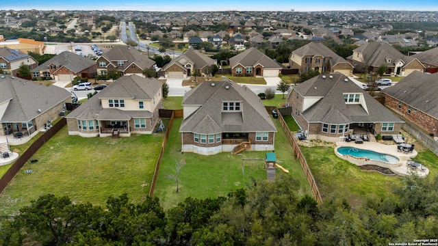 drone / aerial view with a residential view