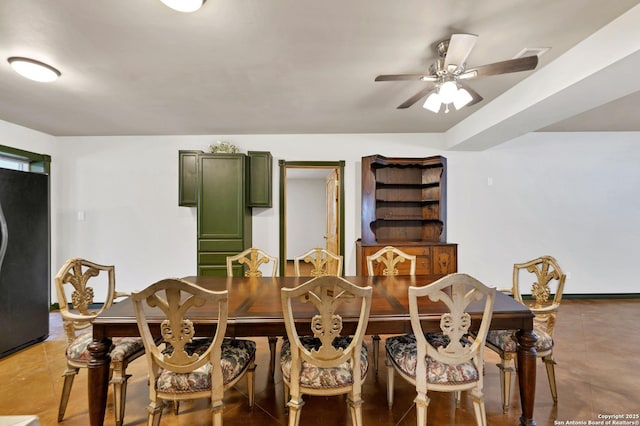 dining space featuring ceiling fan