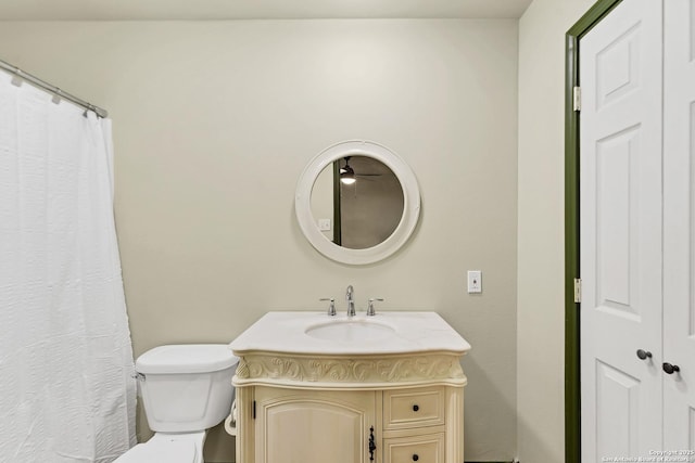 full bathroom featuring vanity and toilet