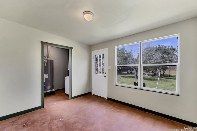 interior space featuring water heater and baseboards