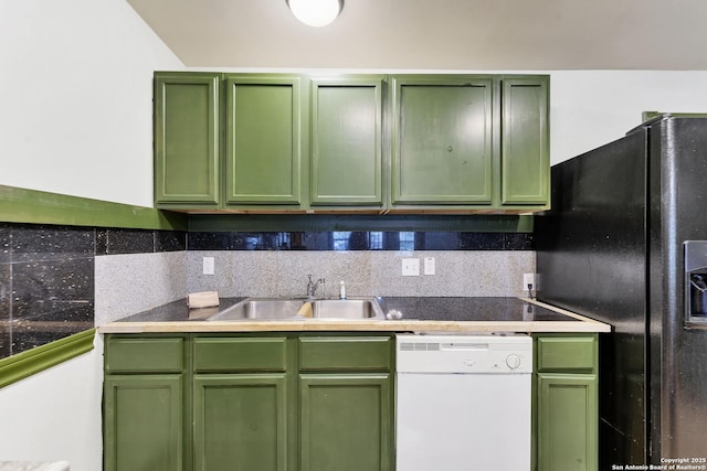 kitchen with white dishwasher and green cabinetry