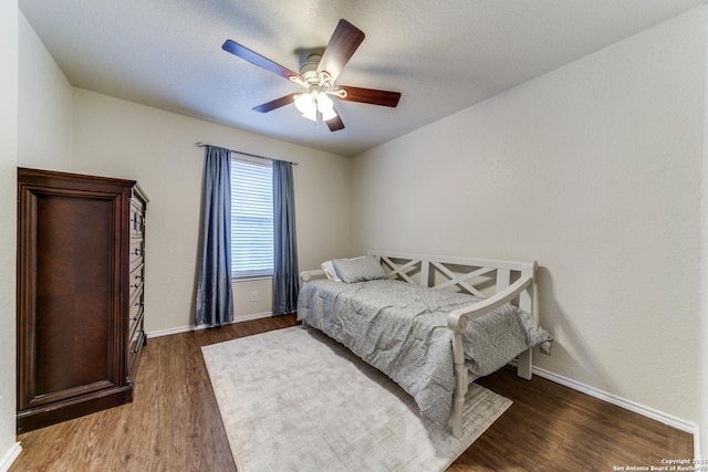 16110 Ambush Grv, San Antonio, TX 78247 - bedroom featuring a ceiling fan, wood finished floors, and baseboards