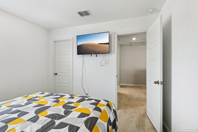 carpeted bedroom with visible vents