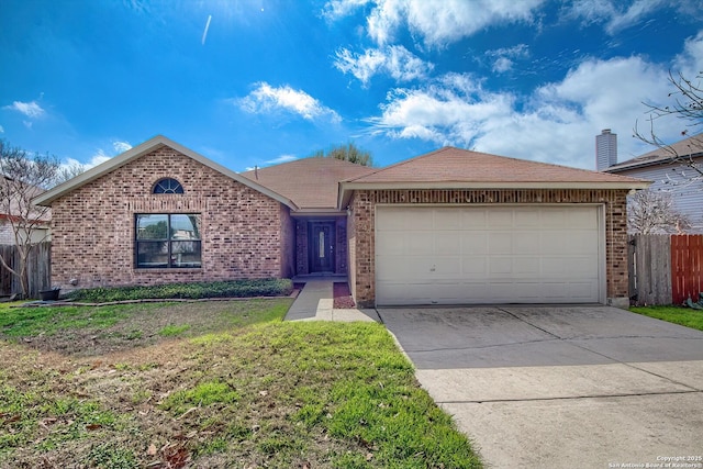 ranch-style house featuring brick siding, fence, a garage, driveway, and a front lawn