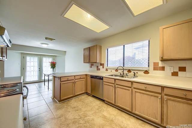 kitchen with french doors, visible vents, stainless steel dishwasher, a sink, and a peninsula