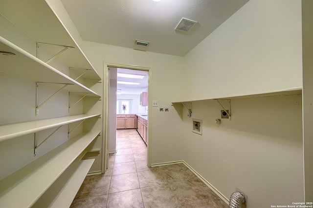 laundry room featuring washer hookup, laundry area, hookup for an electric dryer, and visible vents