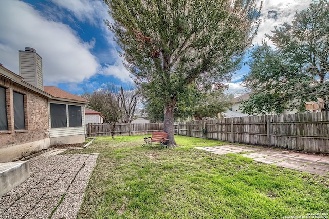 view of yard featuring a fenced backyard