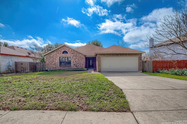 ranch-style house featuring an attached garage, brick siding, fence, concrete driveway, and a front yard