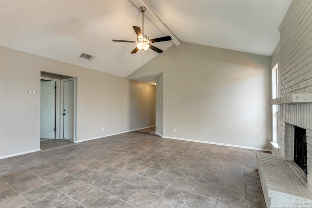 unfurnished living room with baseboards, visible vents, a ceiling fan, lofted ceiling with beams, and a fireplace