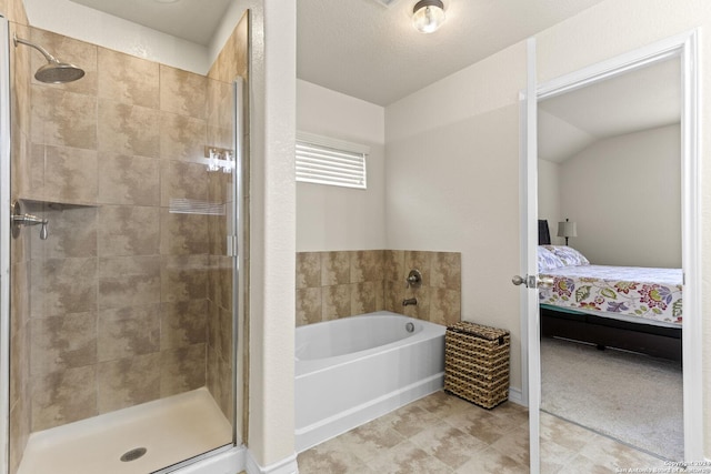 bathroom featuring a garden tub, a stall shower, connected bathroom, and a textured ceiling