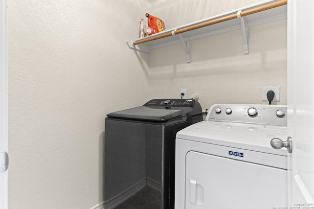 washroom with laundry area and separate washer and dryer