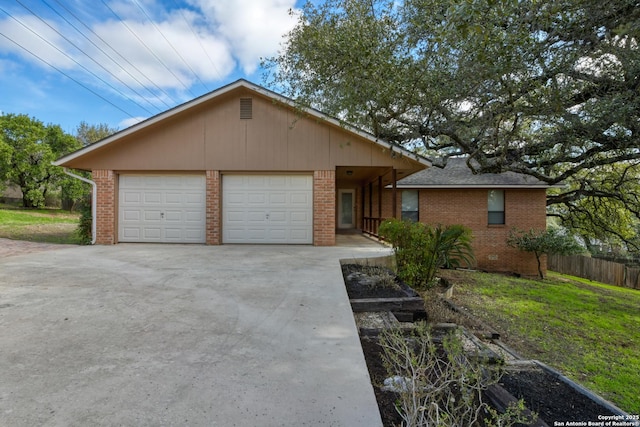 single story home featuring a garage, brick siding, fence, and a shingled roof