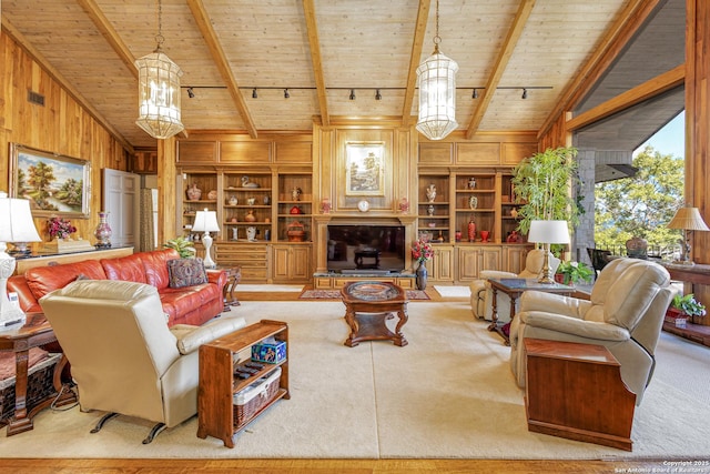 living area with built in features, wooden ceiling, carpet flooring, and wooden walls